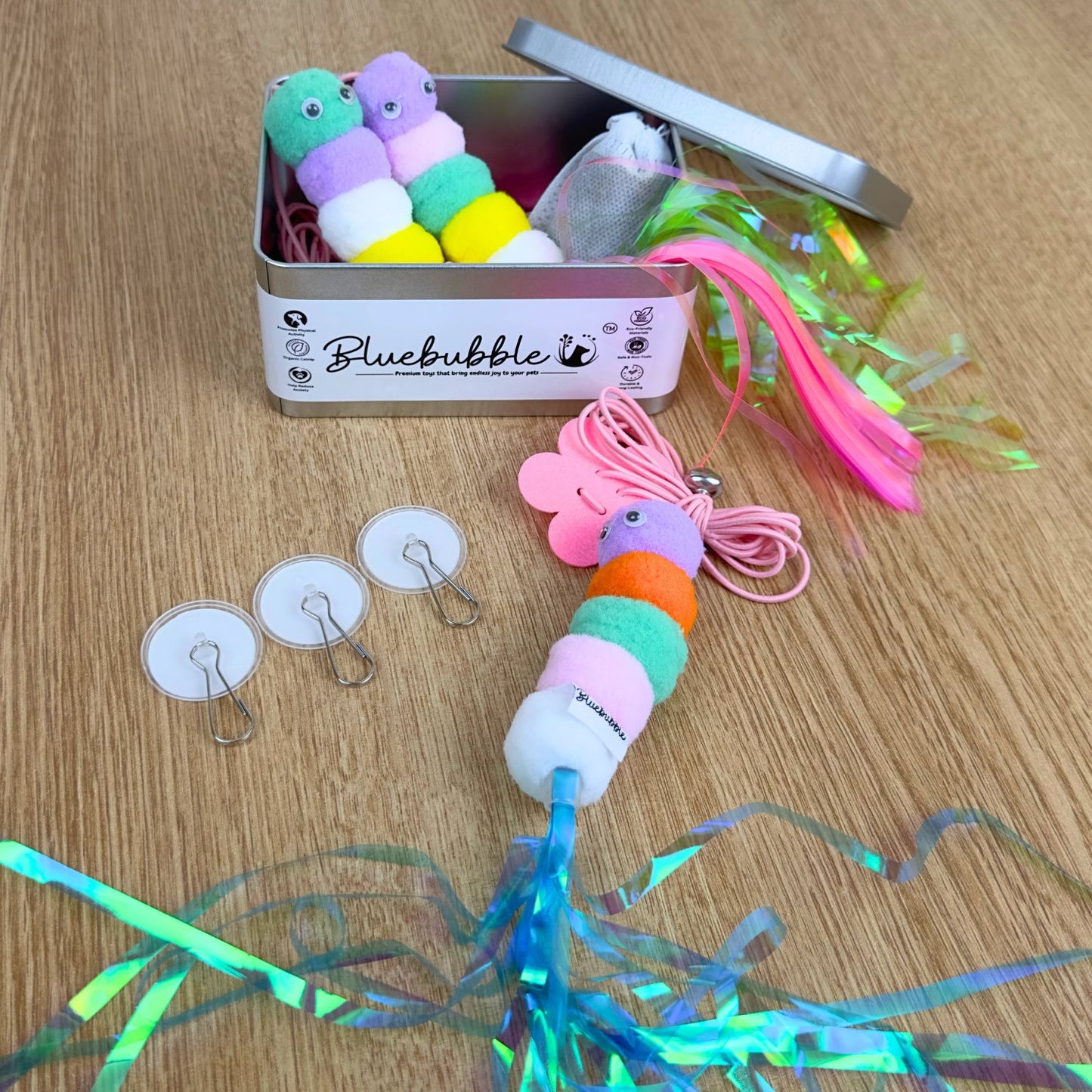 Raupenfederbälle mit Glöckchen